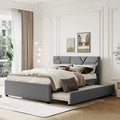 Lit plateforme capitonné gris grand lit avec tête de lit motif brique et lit gigogne double