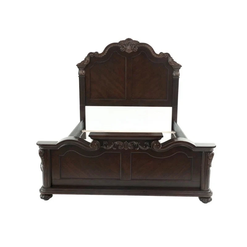 Lit queen en bois superbement sculpté, finition noyer foncé et placage