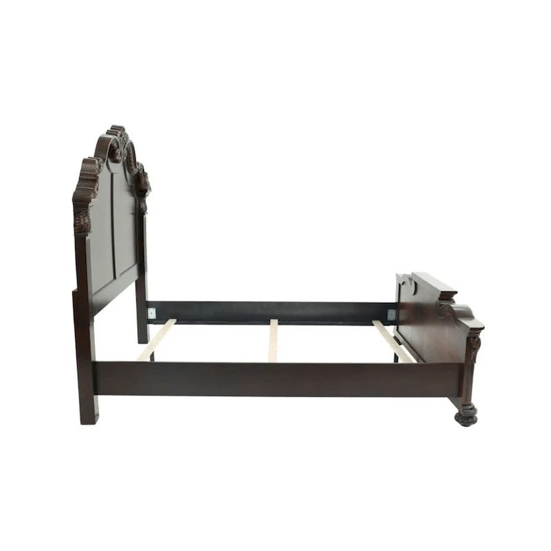 Lit queen en bois superbement sculpté, finition noyer foncé et placage