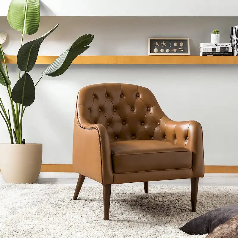 Fauteuil tonneau Melisa Classic en cuir véritable avec pieds en bois et dossier capitonné de HULALA HOME