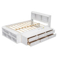 Lit double avec tête de lit bibliothèque, tiroirs de rangement sous le lit et coffre de rangement en bout de lit