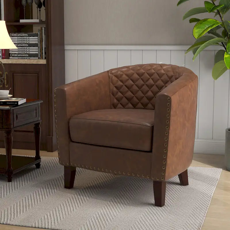 Fauteuil pivotant Ethan en cuir PU avec garniture cloutée