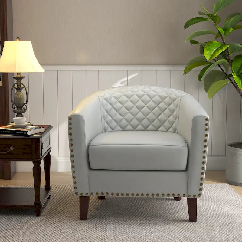 Fauteuil pivotant Ethan en cuir PU avec garniture cloutée